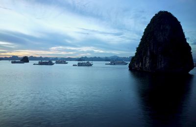 Scenic view of bay against sky