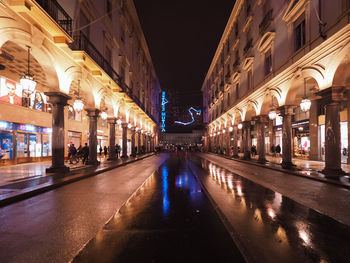 Illuminated buildings in city at night