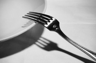 Close-up of metallic object on table