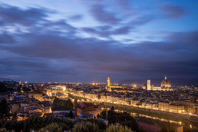 High angle view of illuminated buildings in city