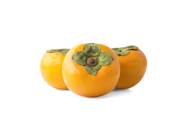 Close-up of orange against white background