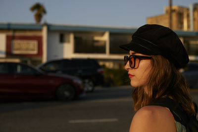 Portrait of young woman in sunglasses