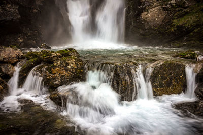 Scenic view of waterfall in forest