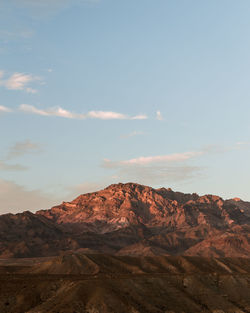 Scenic view of rock formations against sky