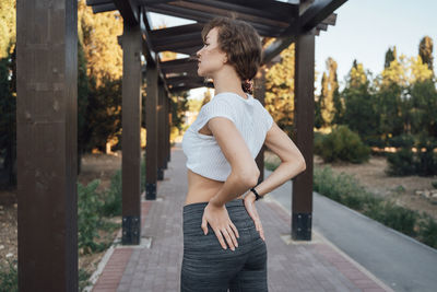 Full length of woman standing at park