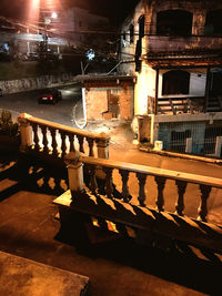 High angle view of illuminated staircase in building at night