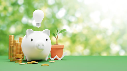 Close-up of piggy bank on table