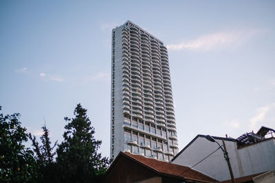 Low angle view of modern building against sky