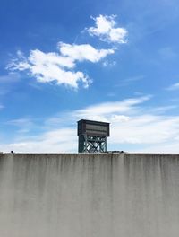 Low angle view of built structure against blue sky