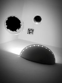 High angle view of illuminated ball on table at home