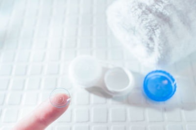 Close-up of hand holding eyeglasses