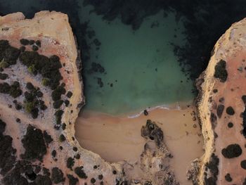 High angle view of rocks on beach