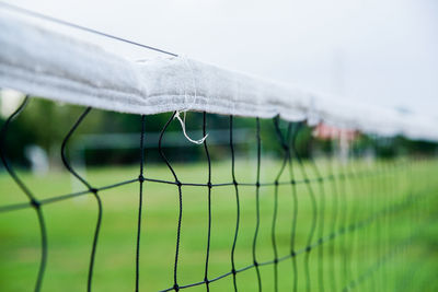 Close-up of umbrella against sky