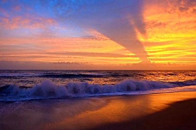 Scenic view of sea at sunset