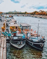 High angle view of fishing boats moored at harbor