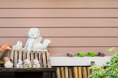 Close-up of statue against wall