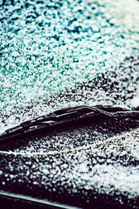 Full frame shot of raindrops on swimming pool