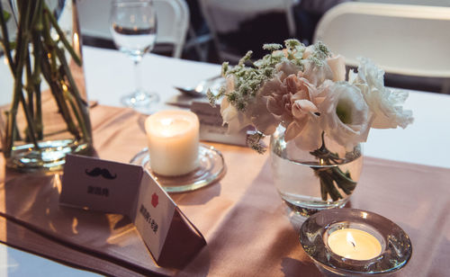 Close-up of roses in vase on table