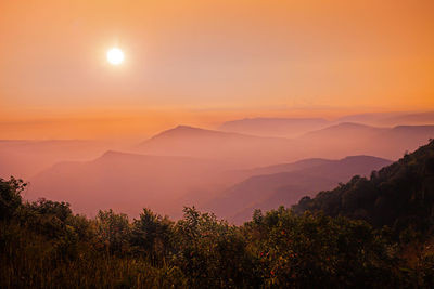 Scenic view of mountains against sky during sunset