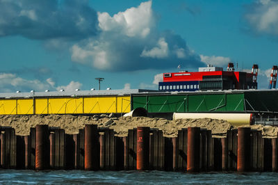 Pier over sea against sky