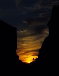 Low angle view of dramatic sky at sunset