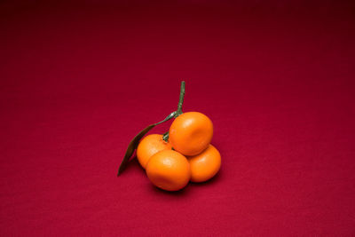 Close-up of orange fruit on table