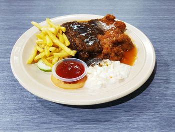 Close-up of food in plate on table