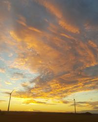 Low angle view of dramatic sky during sunset