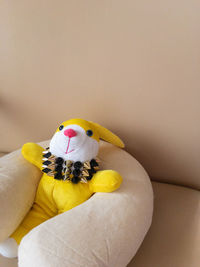 Close-up of a bunny plushie on top of sofa