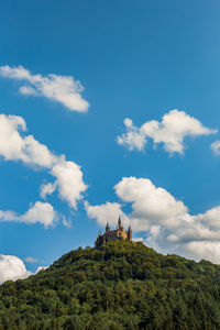 Building against cloudy sky