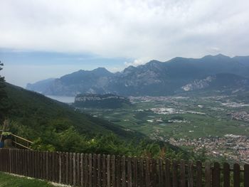 Scenic view of landscape and mountains against sky