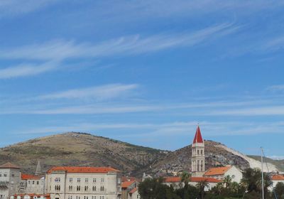 Houses against blue sky