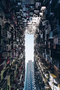 Low angle view of illuminated buildings against sky