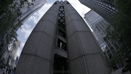 Low angle view of skyscrapers against sky