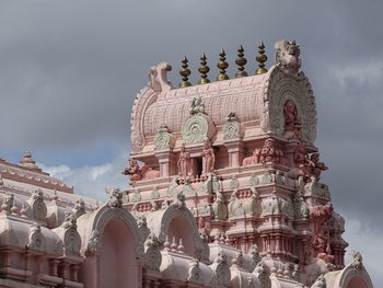 Low angle view of statue against sky