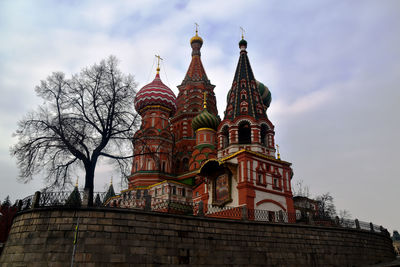 Low angle view of saint basil's cathedral against cloudy sky