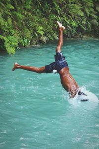 Man swimming in sea