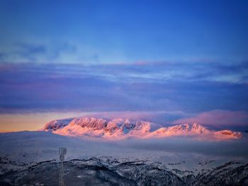 Scenic view of mountains against sky during winter