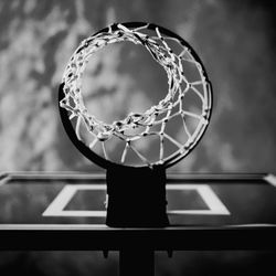 Directly below shot of basketball hoop against sky