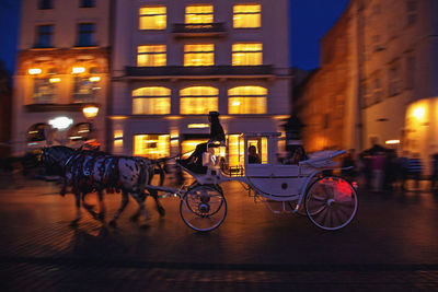 Bicycles on street in city at night