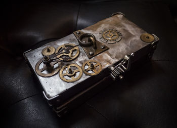 High angle view of metal decorations on table