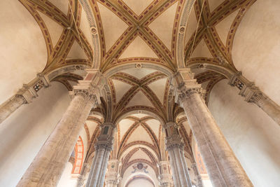 Low angle view of ornate ceiling of building