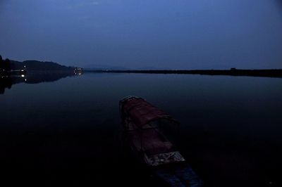 View of calm lake at dusk