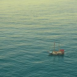 High angle view of boats sailing in calm sea