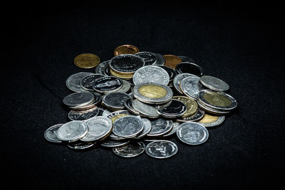 High angle view of coins on table