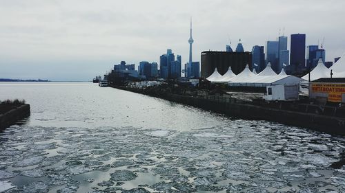 Buildings in distance with waterfront