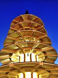 Low angle view of built structure against blue sky