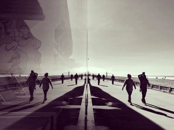 People on road against sky