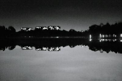 Reflection of trees in calm lake