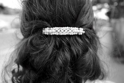 Rear view of woman wearing hair clip